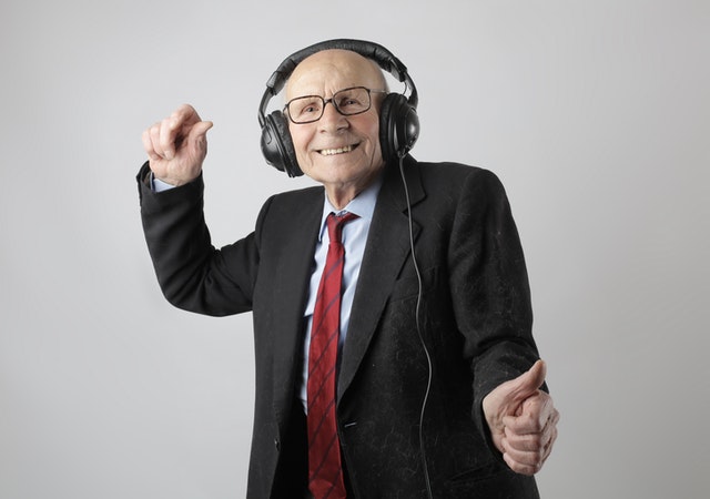 Elderly Man Listening to Music