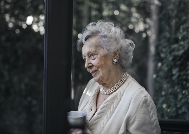 Elderly Woman Drinking Tea
